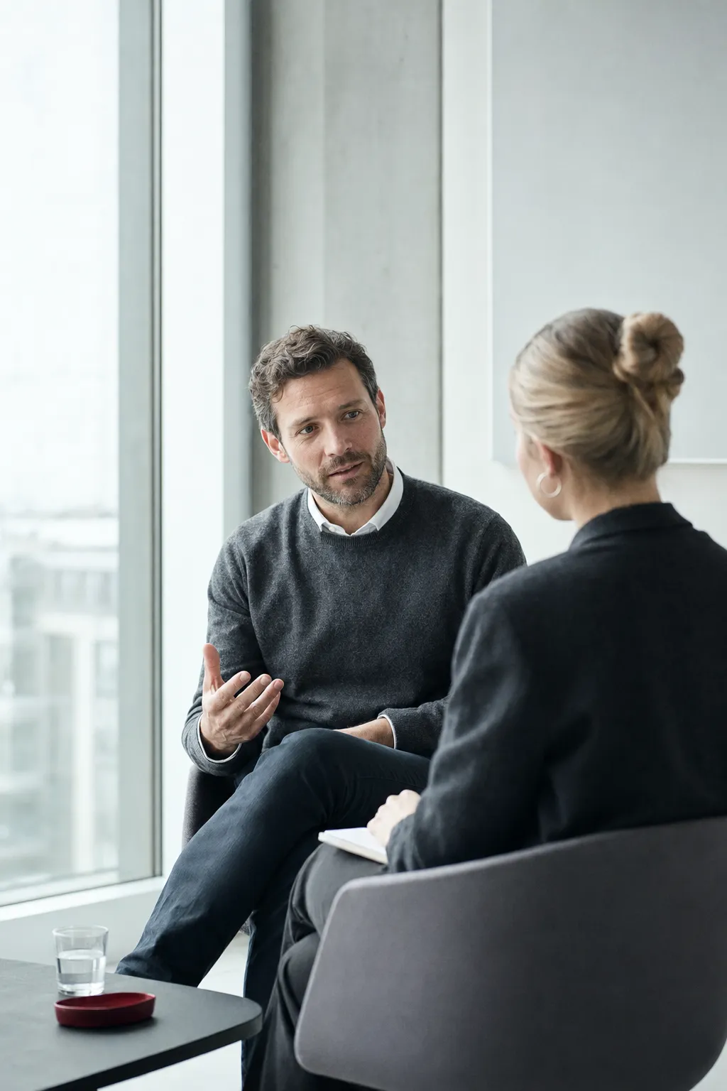 Two colleagues in a development conversation.